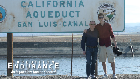 Cameron Craig and Nate Page stand at the San Luis Canal. They traveled to Central Valley, California to research the impact drought has on agriculture and the residents of Fresno.